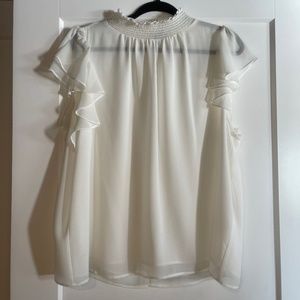 1 state white blouse